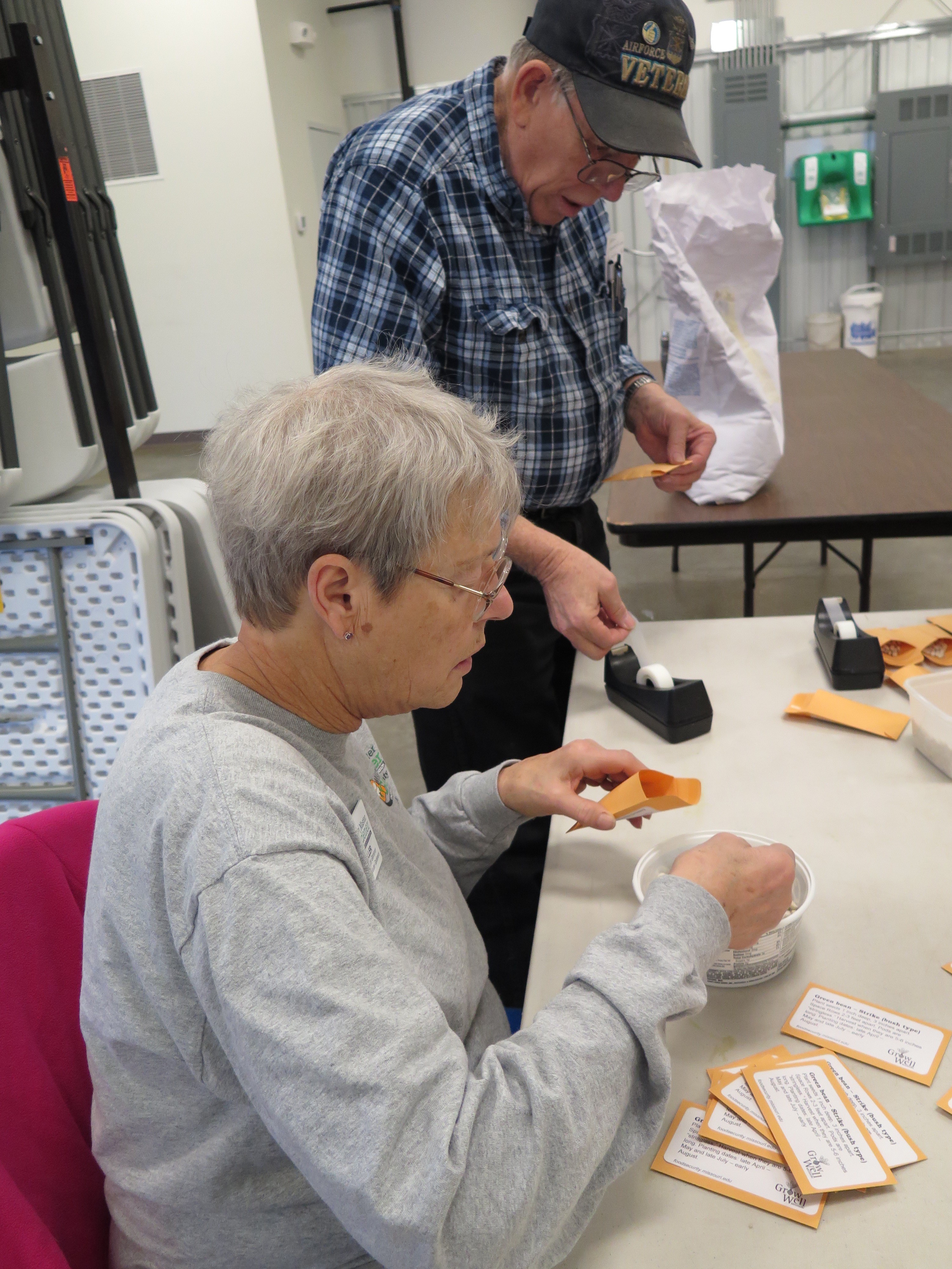 Pat Miller and Dayton Shepherd are among the many Master Gardener and Grow Well Missouri partners who volunteer at the Mexico Help Center. MU Extension Master Gardeners and community volunteers sort and package bulk seeds to give to food pantry clients wh