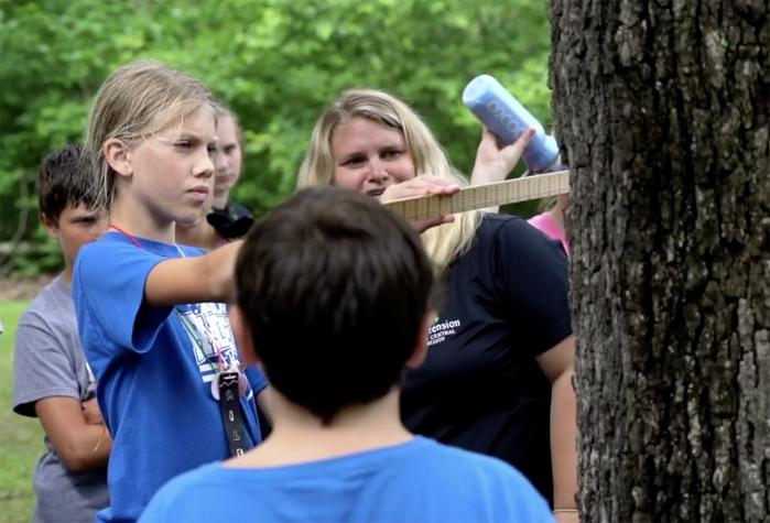 MU Extension provides educational opportunities for Missourians of all ages. Natural resources specialist Sarah Havens teaches youths how important trees are to the environment.
