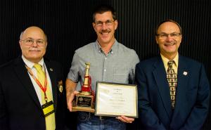 Adjunct instructor Robert Shramek Jr., assistant chief and training officer for Lincoln County Fire Protection District 1, was named MU FRTI’s 2016 Fire Service Instructor of the Year. Pictured, from left: MU FRTI director David Hedrick, Shramek, and MU FMU FRTI